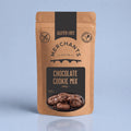 A stand-up pouch of Merchants Chocolate Cookie Mix, 250g, featuring a kraft paper design with black panels and a photo of chocolate cookies on the front, set against a light blue background.